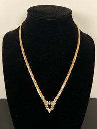 LOT 9 - 14k GOLD AND DIAMOND NECKLACE