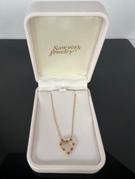 LOT 36 - 18k GOLD HEART NECKLACE WITH STONES