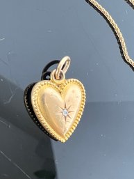 LOT 52 - 14k GOLD NECKLACE AND PENDANT