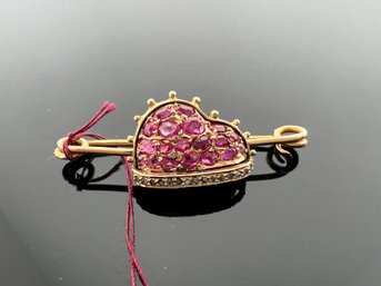 LOT 119 - 14k GOLD BROOCH WITH DIAMOND CHIPS AND RUBIES