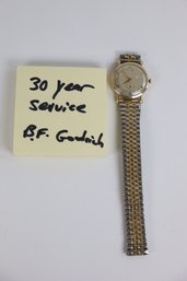 LOT 409 - 10K GOLD HAMILTON WATCH, 30 YEAR SERVICE WATCH, B.F. GOODRICH