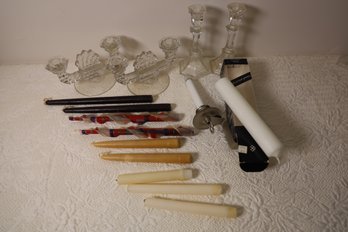 LOT 34 - GLASS CANDLE STICKS AND CANDLES