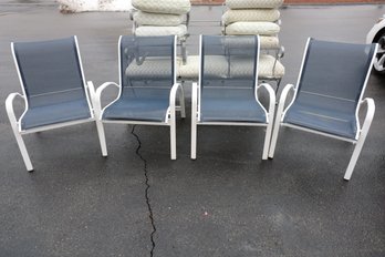 LOT 130 - FOUR OUTDOOR CHAIRS - NICE QUILITY!