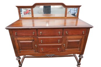 LOT 143 - STUNNING ANTIQUE MIRRORED BUFFET WITH WHEELED FEET