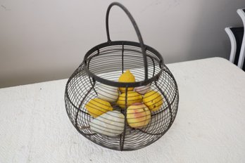 LOT 188 - HEAVY METAL BASKET WITH FRUIT THAT ARE HEAVY LIKE STONES