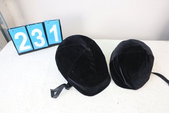 LOT 231 - TWO RIDING HELMETS