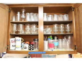 TWO KITCHEN CABINETS FULL OF CUPS - GLASSES