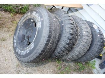 TIRES AND WHEEL LOT - JEEP WRANGLER - LOT NUMBER MARKED 202