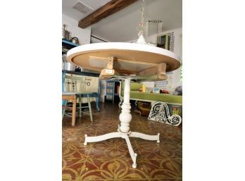 WHITE ROUND TABLE WITH METAL LEGS MARKED 74