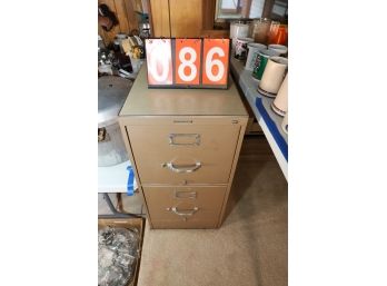 METAL FILE CABINET MARKED 86
