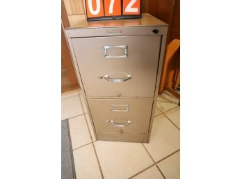 METAL FILE CABINET MARKED 72