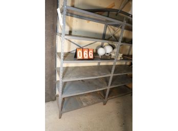 METAL RACKS AS SHOWN - MARKED 66 - BUYER TO BRING TOOLS TO REMOVE THEM FROM WALL