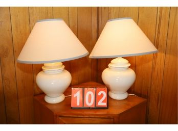 2 VINTAGE LAMPS MARKED 102