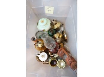 Bin Of Oil Lamps And Lanterns As Shown