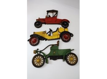 THREE VERY EARLY SEXTON WALL HANGING DECOR CARS - MARKED 22