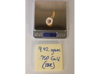 LOT 24 - 9.42 GRAMS OF MARKED 750 GOLD (18k) TOTAL WEIGHT - ESTIMATED: $250- $300
