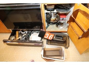 LOT 36 - COOKING ITEMS UNDER STOVE / AND IN DRAWER TO RIGHT OF STOVE