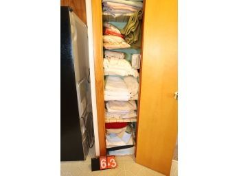LOT 63 - CONTENTS OF CLOSET: TOWELS / BLANKETS AND MORE