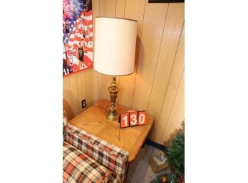 LOT 130 - LAMP AND VINTAGE TABLE ITS ON ( BASEMENT)