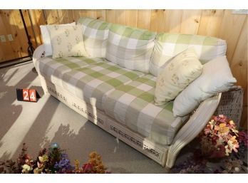 LOT 24 - COUCH IN SUNROOM