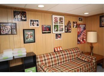LOT 144 - SPORTS POSTERS AND FRAMED ART  ON WALLS IN BASEMENT