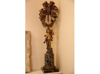 VERY ORNATE TALL CHARUB CANDLE STAND