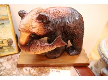 CARVED WOODEN BEAR WITH FISH IN MOUTH