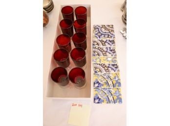 RED GLASSWARE AND COLORFUL TILES
