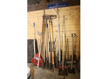 BIG LOT OF LANDSCAPING TOOL LIKE TAMPERS, RAKES, SNOW SHOVEL,PICKS AND WHATS SHOWN (3RD BARN)
