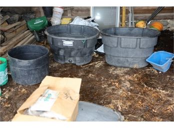 LOT OF 2 LARGE RUBBERMAID , 1 MED SIZE BLACK PASTIC, 1 SMALL BLUE FEEDING BUCKET (LIVESTOCK LOT) MIDDLE SHED