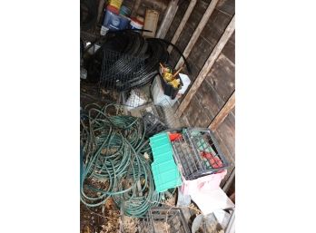 BIG LOT (MIDDLE SHEDRIGHT SIDE) OF MANY THINGS SUCH AS EDGING, HOSES, METAL