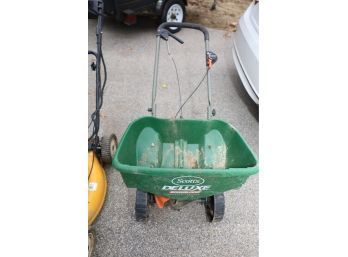 TWO PUSH MOWERS AND SEED SPREADER LOT ALL AS IS UNTESTED AND UNKNOWN!