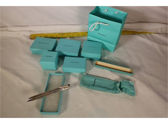 PAIR OF EARLY TIFFANY & CO. STERLING PENS/PENCILS ALONG WITH SEVERAL BOXES