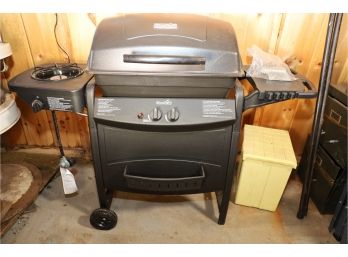 PROPANE BBQ GRILL - APPEARS NEVER USED.