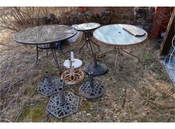 OUTDOOR TABLES AND UMBRELLA STANDS  - LOT  (BACK PORCH AREA)