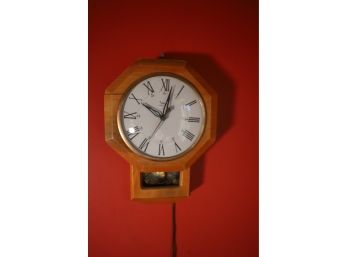 WALL CLOCK IN RED ROOM