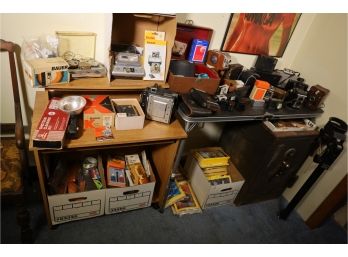 HUGE LOT OF CAMERAS AND RELATED IN BASEMENT OFFICE
