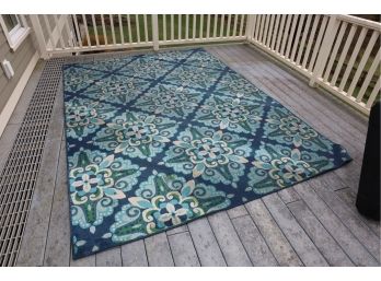 OUTDOOR AREA RUG ON BACK PORCH
