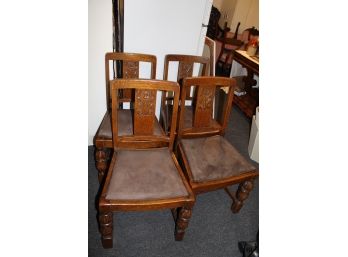 Four Carved Chairs