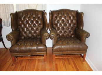 Pair Of Leather Wing Back Tuffted Chairs