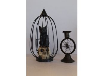 CAT IN CAGE AND CANDLE STICK