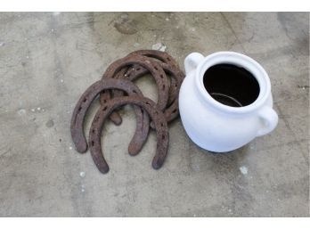 HORSE SHOES AND VASE