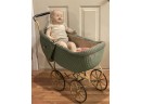 Antique Doll And Wicker Stroller