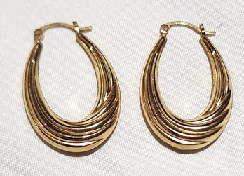 14K Yellow Gold Puffy Twisted Oval Hoop Earrings 2 Grams