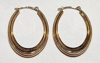 14K Yellow Gold Puffy Twisted Oval Hoop Earrings 4 Grams