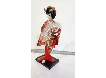 Japanese Geisha Doll In Red Kimono