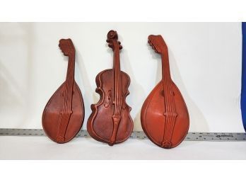 Cast Wall Hanging Instruments