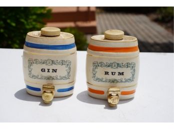 LOT OF GIN AND RUM PORCELAIN PITCHERS,5IN HEIGHT