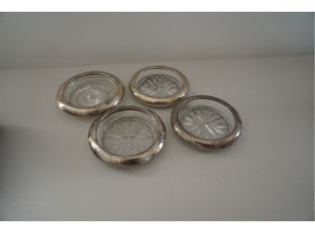 LOT OF 4 COASTERS WITH STERLING RIM