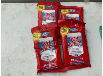 LOT OF 4 PACKAGES OF WET WIPES